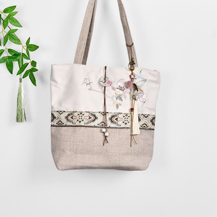 Bolso de hombro de lona y poliéster con bordado de magnolia y Buddha Stones