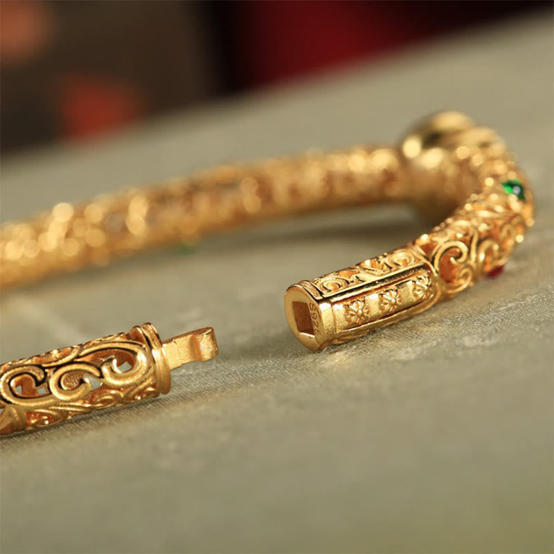 Pulsera de la suerte con calabaza, nubes auspiciosas y Buddha Stones cian bañado en cobre y oro.
