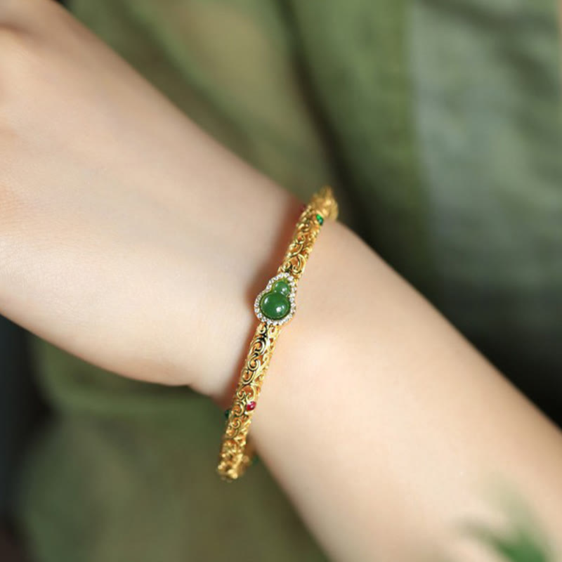 Pulsera de la suerte con calabaza, nubes auspiciosas y Buddha Stones cian bañado en cobre y oro.
