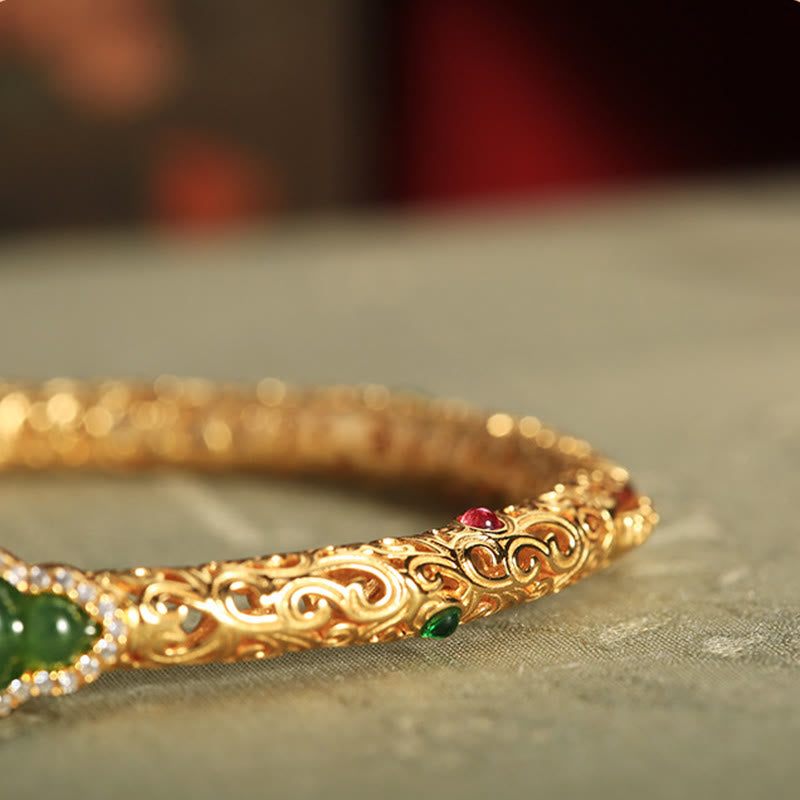 Pulsera de la suerte con calabaza, nubes auspiciosas y Buddha Stones cian bañado en cobre y oro.