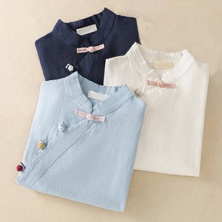 Camisa de manga tres cuartos de algodón y lino para mujer, estilo casual, con cuello alto inclinado y botones de Buddha Stones. - image 25