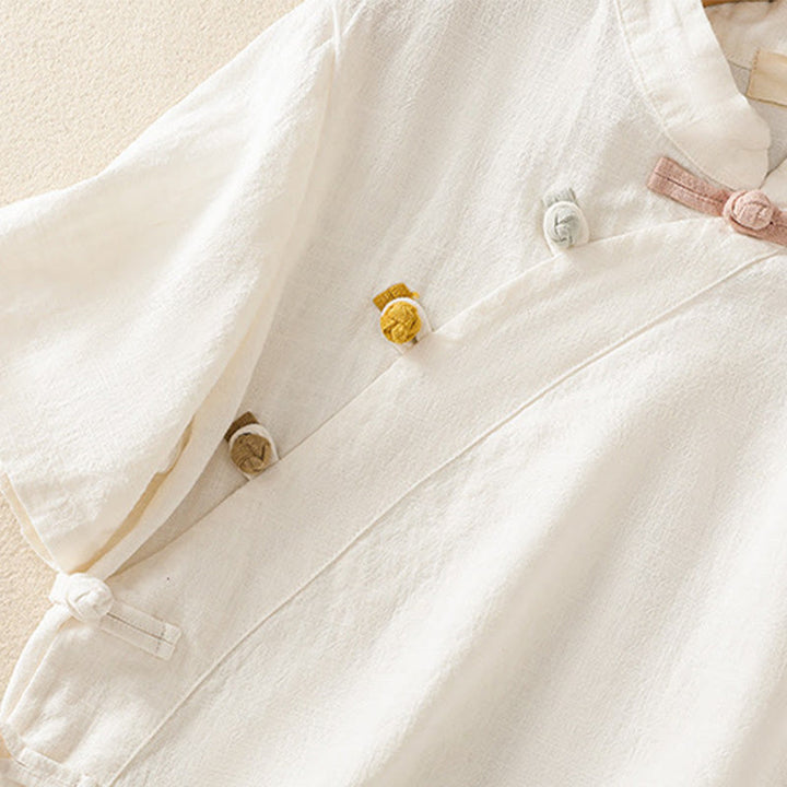 Camisa de manga tres cuartos de algodón y lino para mujer, estilo casual, con cuello alto inclinado y botones de Buddha Stones. - image 11