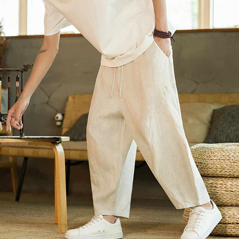 Pantalones harén de lino con cintura elástica y bolsillos para hombre, estilo retro, informal, de color sólido, con diseño simple y cordón ajustable. - image 1