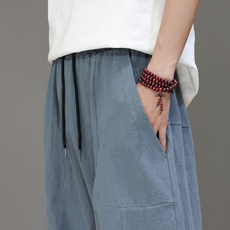Pantalones casuales Buddha Stones de algodón con cintura elástica, pierna ancha y bolsillos, con cordón ajustable y diseño de entrepierna baja para hombre.