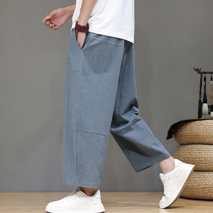 Pantalones casuales Buddha Stones de algodón con cintura elástica, pierna ancha y bolsillos, con cordón ajustable y diseño de entrepierna baja para hombre.