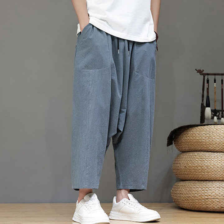 Pantalones casuales Buddha Stones de algodón con cintura elástica, pierna ancha y bolsillos, con cordón ajustable y diseño de entrepierna baja para hombre.
