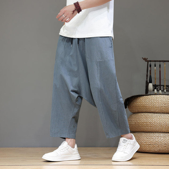 Pantalones casuales Buddha Stones de algodón con cintura elástica, pierna ancha y bolsillos, con cordón ajustable y diseño de entrepierna baja para hombre.