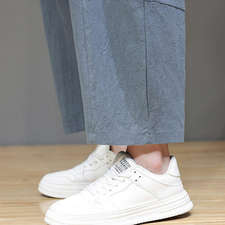 Pantalones casuales Buddha Stones de algodón con cintura elástica, pierna ancha y bolsillos, con cordón ajustable y diseño de entrepierna baja para hombre.