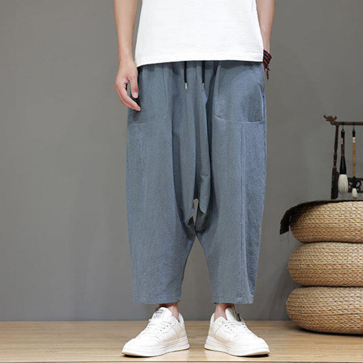 Pantalones casuales Buddha Stones de algodón con cintura elástica, pierna ancha y bolsillos, con cordón ajustable y diseño de entrepierna baja para hombre.