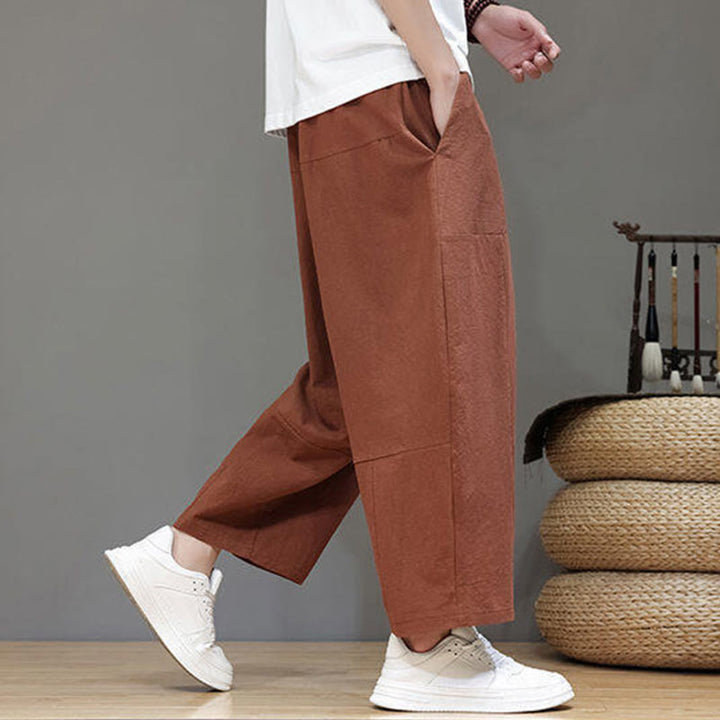 Pantalones casuales Buddha Stones de algodón con cintura elástica, pierna ancha y bolsillos, con cordón ajustable y diseño de entrepierna baja para hombre.
