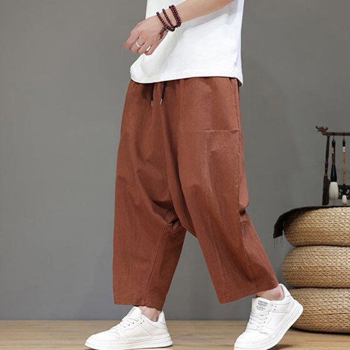 Pantalones casuales Buddha Stones de algodón con cintura elástica, pierna ancha y bolsillos, con cordón ajustable y diseño de entrepierna baja para hombre.