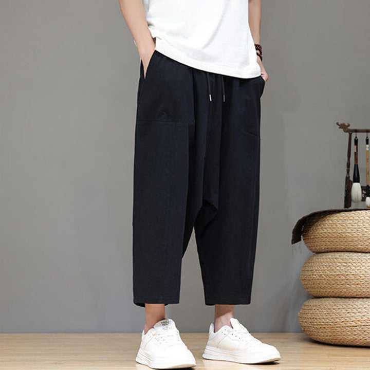 Pantalones casuales Buddha Stones de algodón con cintura elástica, pierna ancha y bolsillos, con cordón ajustable y diseño de entrepierna baja para hombre.