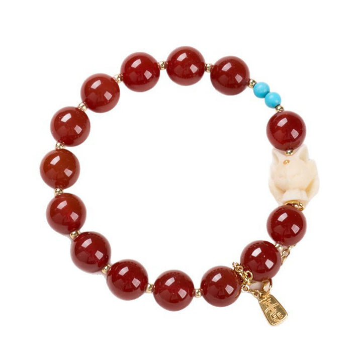 Pulsera de confianza con Buddha Stones, zorro de nueve colas, ágata roja, marfil, fruta, chapado en cobre y oro.