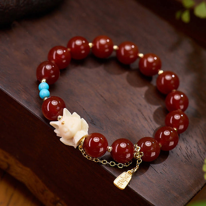 Pulsera de confianza con Buddha Stones, zorro de nueve colas, ágata roja, marfil, fruta, chapado en cobre y oro.