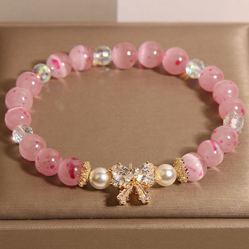 Pulsera de soporte con roseta y lazo de perla de ojo de gato rosa con flor de cerezo y Buddha Stones