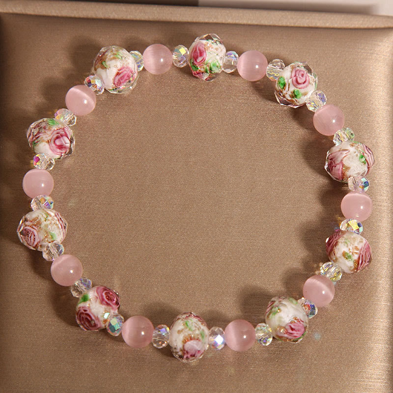Pulsera cálida de ojo de gato con cuentas de cristal rosa Liuli y Buddha Stones