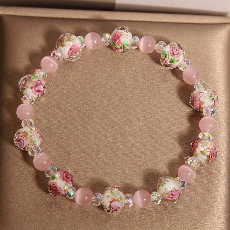Pulsera cálida de ojo de gato con cuentas de cristal rosa Liuli y Buddha Stones