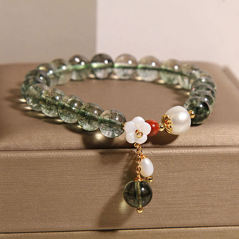Pulsera positiva con flor de concha de perla fantasma verde natural de Buddha Stones