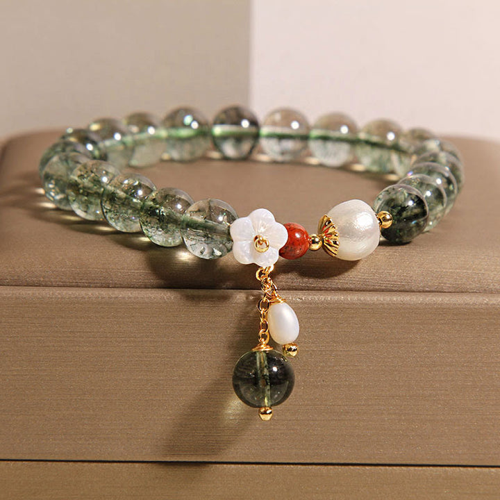 Pulsera positiva con flor de concha de perla fantasma verde natural de Buddha Stones