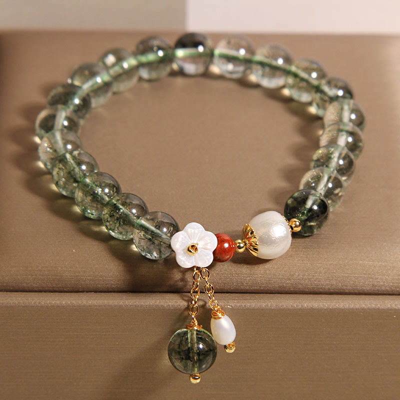 Pulsera positiva con flor de concha de perla fantasma verde natural de Buddha Stones