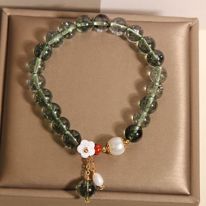 Pulsera positiva con flor de concha de perla fantasma verde natural de Buddha Stones