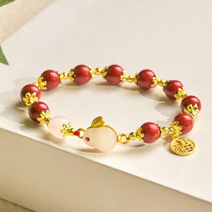 Pulsera con dije de bendición de Buddha Stones de cinabrio y un lindo conejo Fu