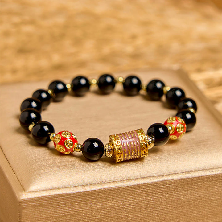 Pulsera de la fortuna con monedas de cobre y cinco escrituras de ónix negro natural de Buddha Stones