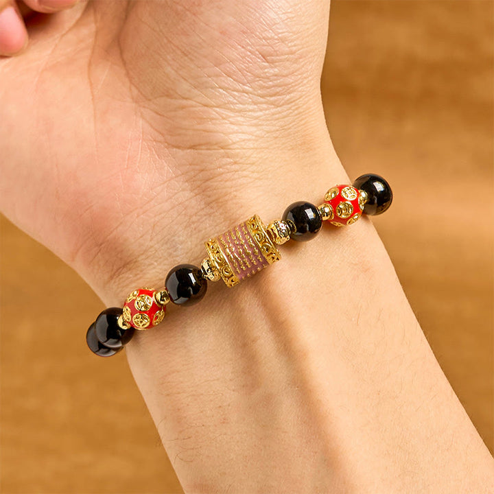 Pulsera de la fortuna con monedas de cobre y cinco escrituras de ónix negro natural de Buddha Stones