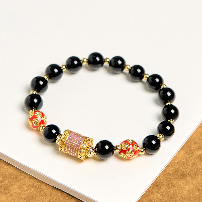 Pulsera de la fortuna con monedas de cobre y cinco escrituras de ónix negro natural de Buddha Stones