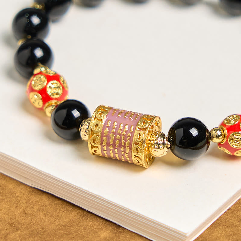 Pulsera de la fortuna con monedas de cobre y cinco escrituras de ónix negro natural de Buddha Stones