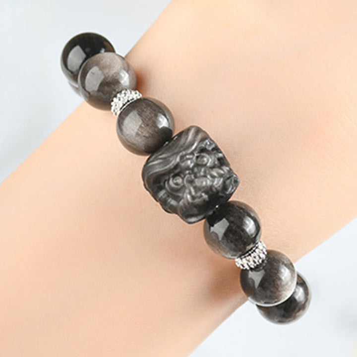 Pulsera protectora de obsidiana con brillo de plata natural y Buddha Stones para danza del león