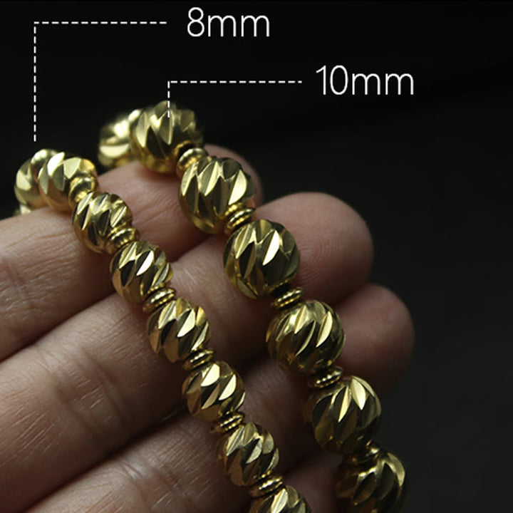 Pulsera de riqueza con cuentas de cobre y latón, con diseño de cuchillo tallado envejecido y Buddha Stones
