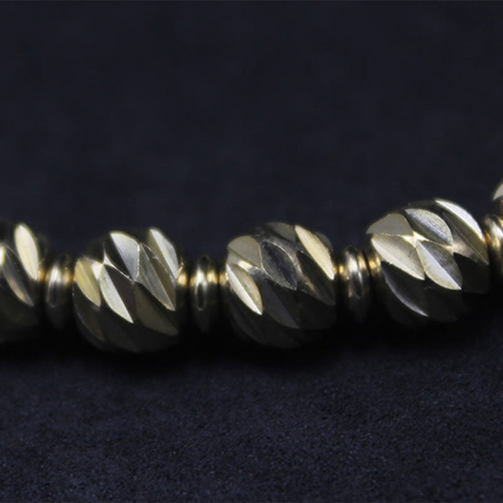 Pulsera de riqueza con cuentas de cobre y latón, con diseño de cuchillo tallado envejecido y Buddha Stones