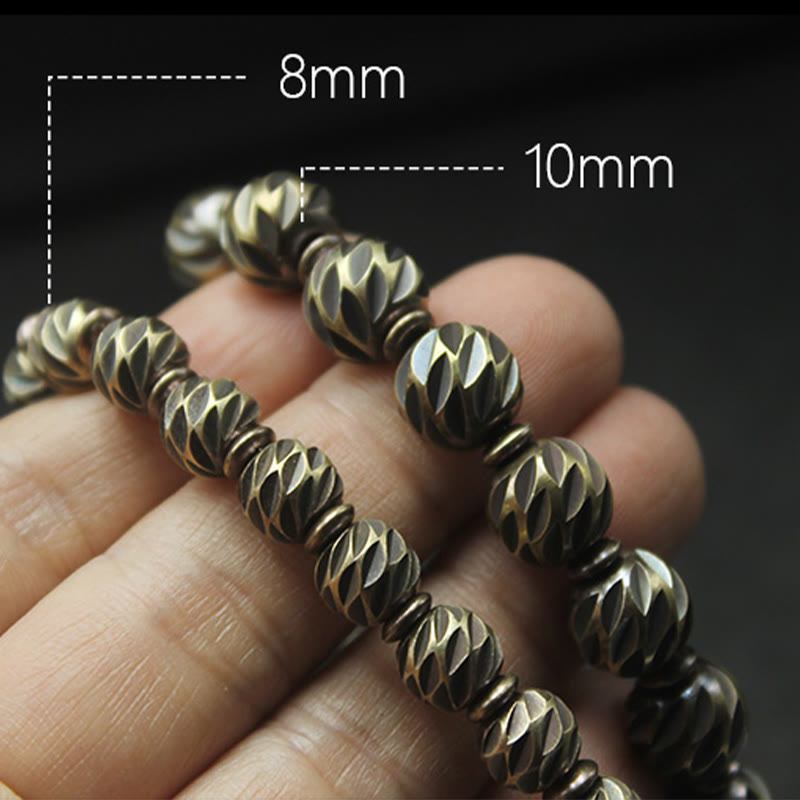 Pulsera de riqueza con cuentas de cobre y latón, con diseño de cuchillo tallado envejecido y Buddha Stones