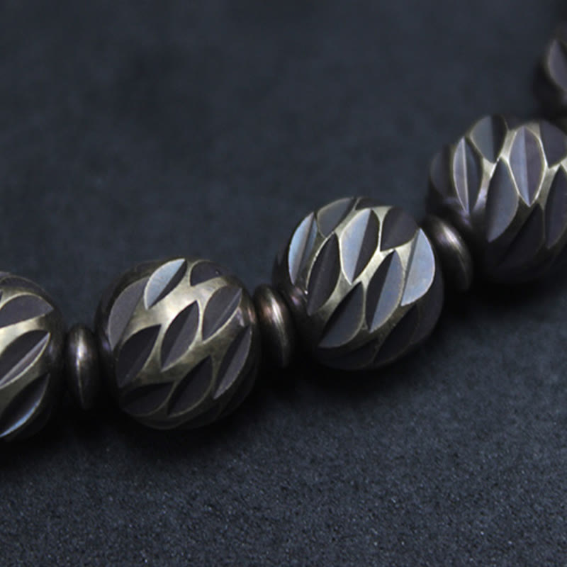 Pulsera de riqueza con cuentas de cobre y latón, con diseño de cuchillo tallado envejecido y Buddha Stones