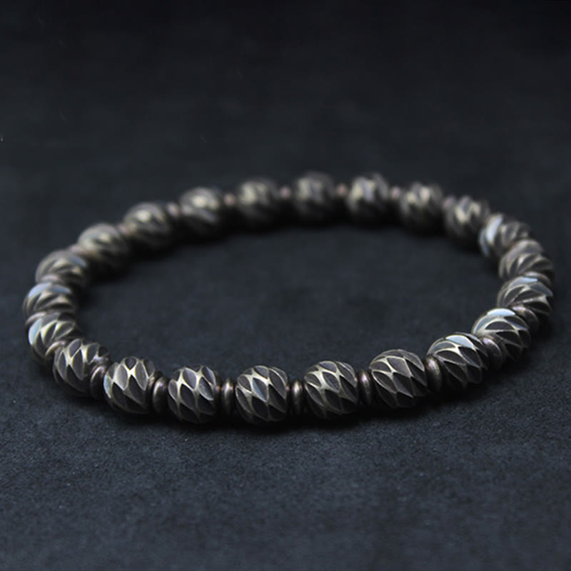 Pulsera de riqueza con cuentas de cobre y latón, con diseño de cuchillo tallado envejecido y Buddha Stones