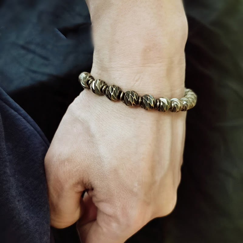 Pulsera de riqueza con cuentas de cobre y latón, con diseño de cuchillo tallado envejecido y Buddha Stones