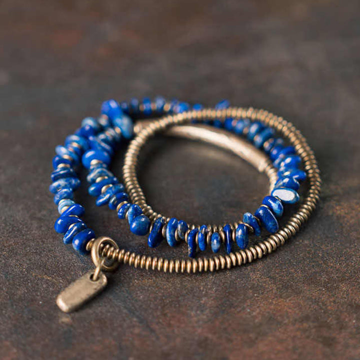 Pulsera de equilibrio de lapislázuli y lazurita con forma irregular de Buddha Stones y triple vuelta - 6,7-6,9 pulgadas (17-17,5 cm) - image 0