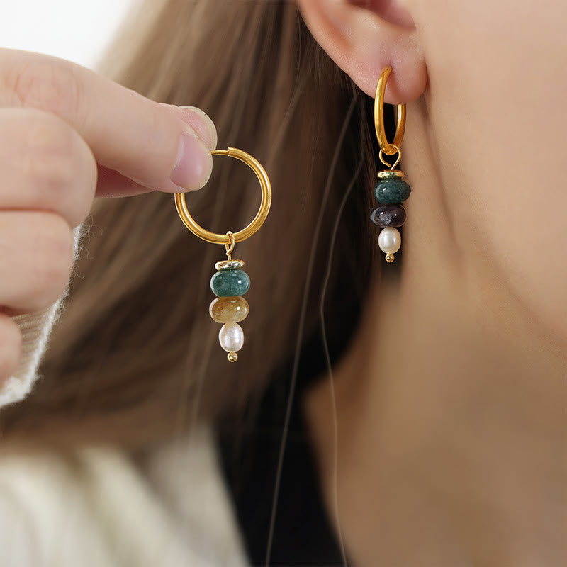 Pendientes de acero y titanio con diseño de piedra marnyi tibetana de Buddha Stones y ágata roja natural.