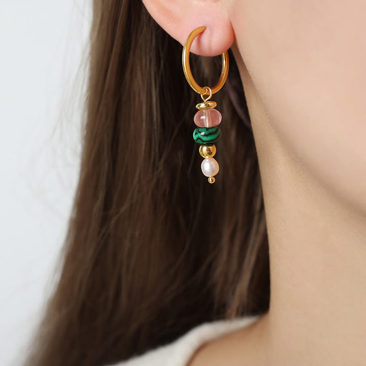 Pendientes de acero y titanio con diseño de piedra marnyi tibetana de Buddha Stones y ágata roja natural.