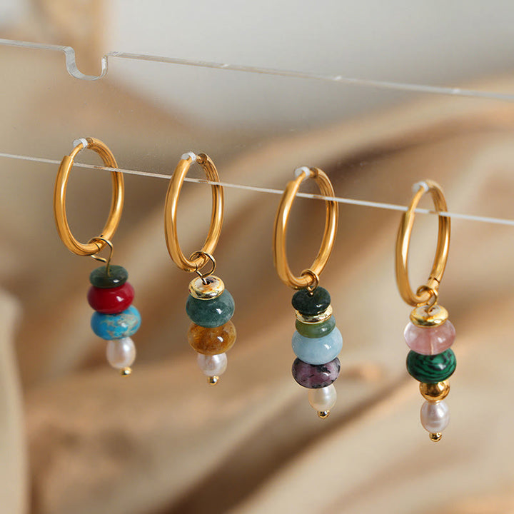 Pendientes de acero y titanio con diseño de piedra marnyi tibetana de Buddha Stones y ágata roja natural.