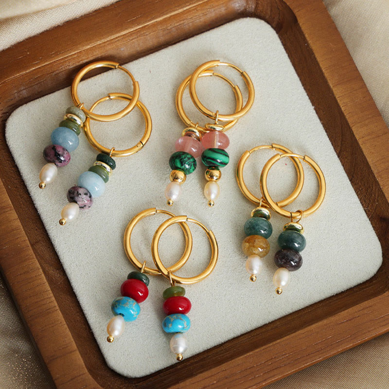 Pendientes de acero y titanio con diseño de piedra marnyi tibetana de Buddha Stones y ágata roja natural.