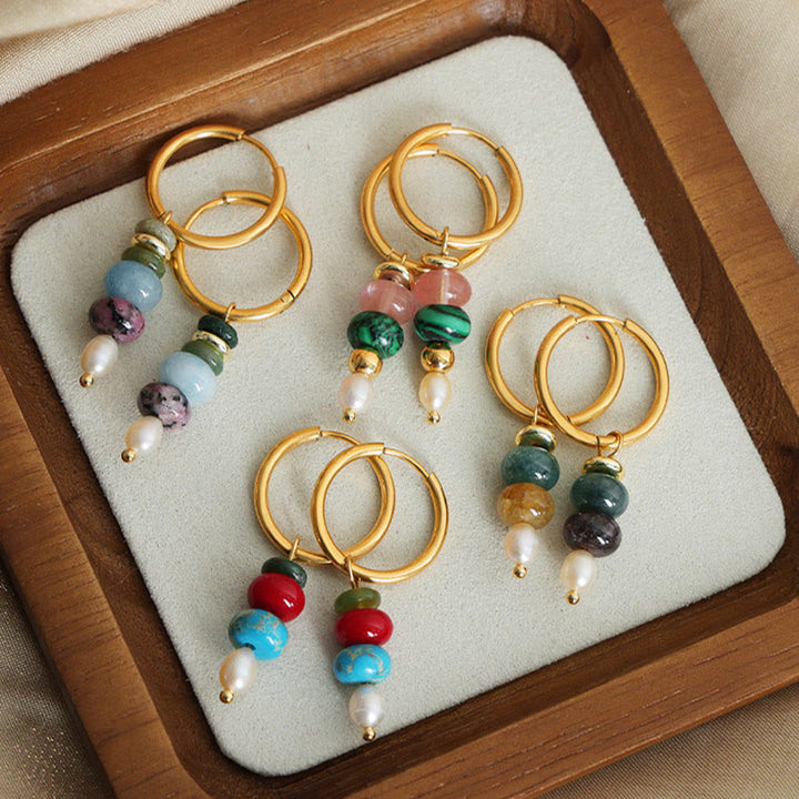 Pendientes de acero y titanio con diseño de piedra marnyi tibetana de Buddha Stones y ágata roja natural.