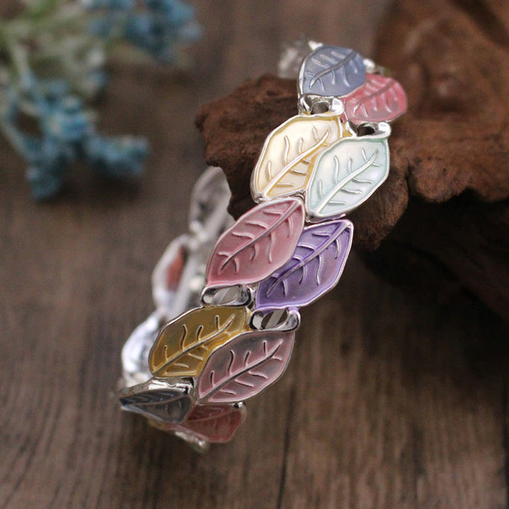 Pulsera elástica de aleación con hojas de colores y Buddha Stones para la suerte