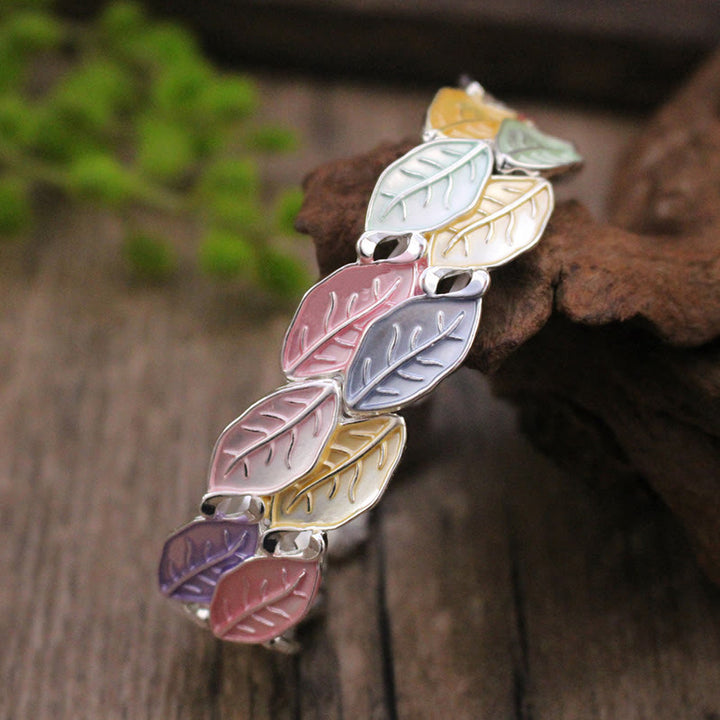 Pulsera elástica de aleación con hojas de colores y Buddha Stones para la suerte