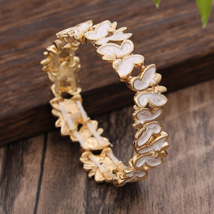 Pulsera elástica de aleación con diseño de mariposas coloridas y Buddha Stones