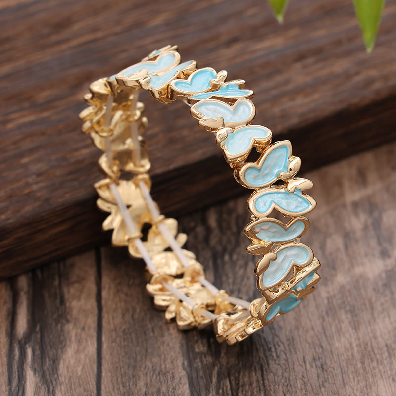 Pulsera elástica de aleación con diseño de mariposas coloridas y Buddha Stones