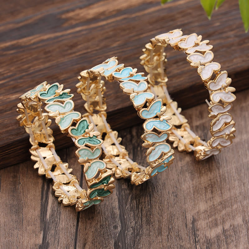 Pulsera elástica de aleación con diseño de mariposas coloridas y Buddha Stones