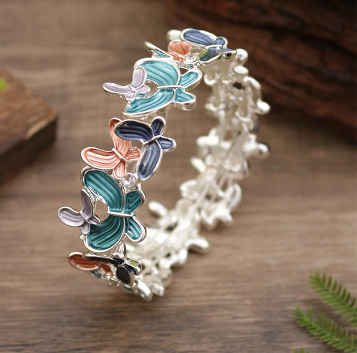 Pulsera elástica de aleación con diseño de mariposas coloridas y Buddha Stones