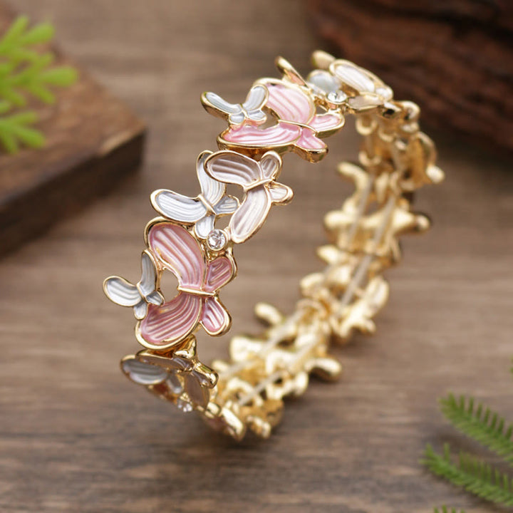Pulsera elástica de aleación con diseño de mariposas coloridas y Buddha Stones